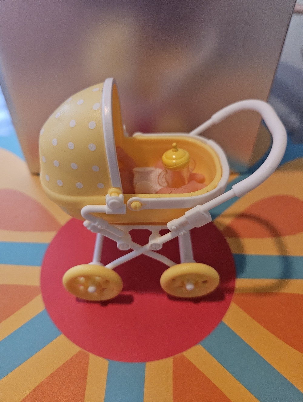 Zuru Mini Baby Doll in Yellow Polka-Dot Stroller - Picture 2 of 7